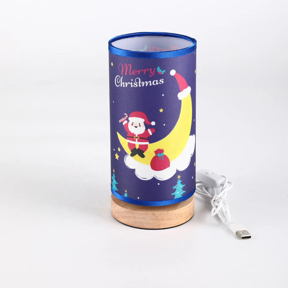 Moon-shaped Santa Claus LED night light with USB plug and bamboo base.