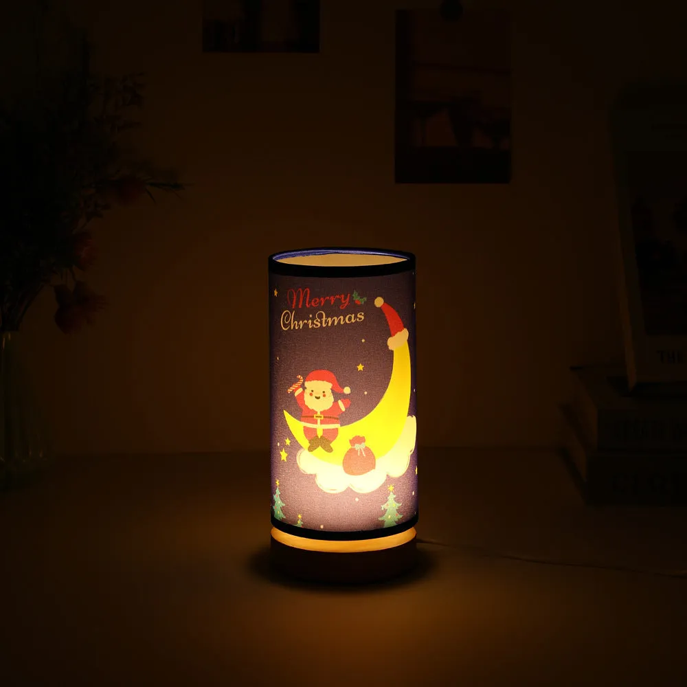 Moon-shaped Santa Claus LED night light with USB plug and bamboo base.