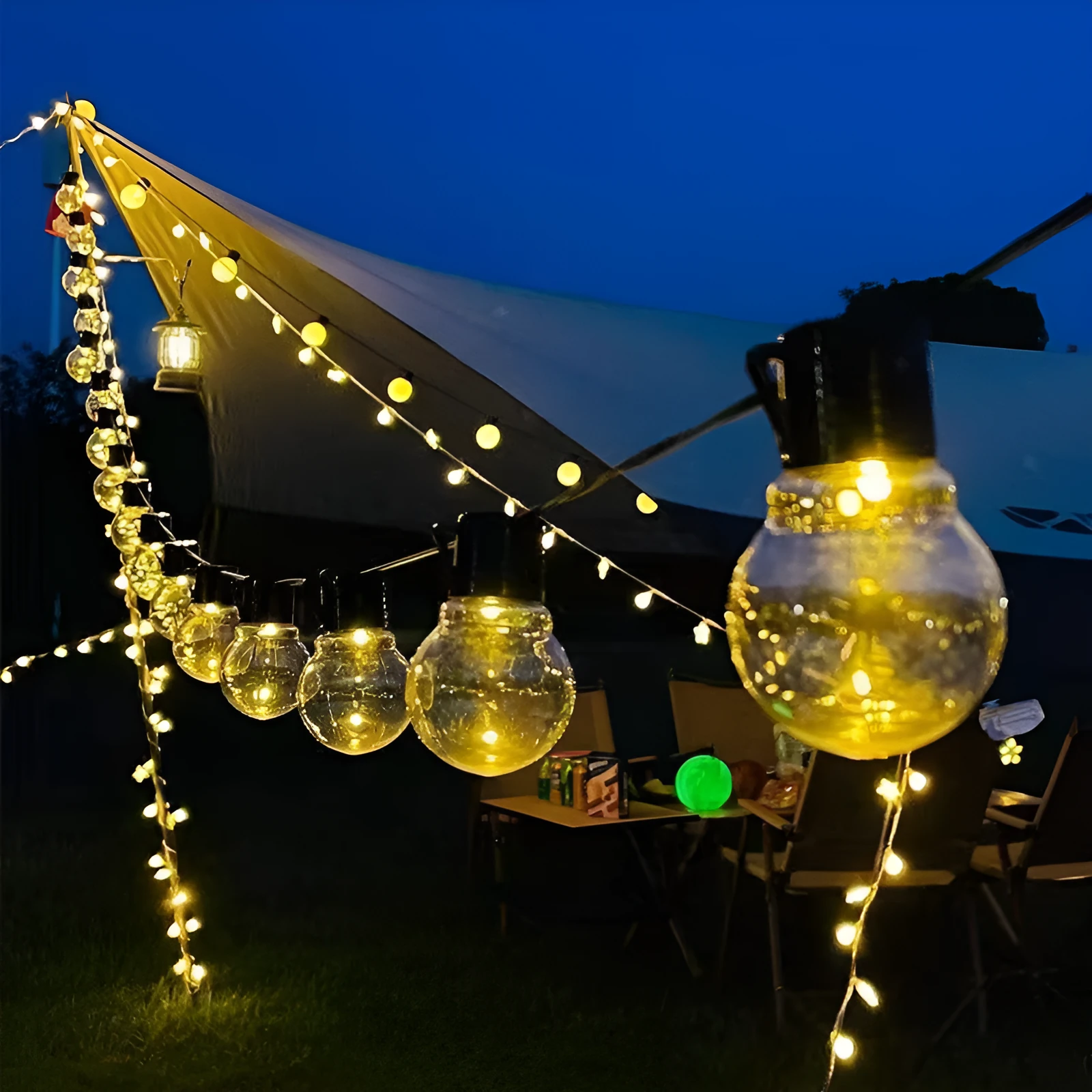 10 metre solar powered decorative festoon lights with 40 LED bulbs for festival tents in black with warm white LEDs