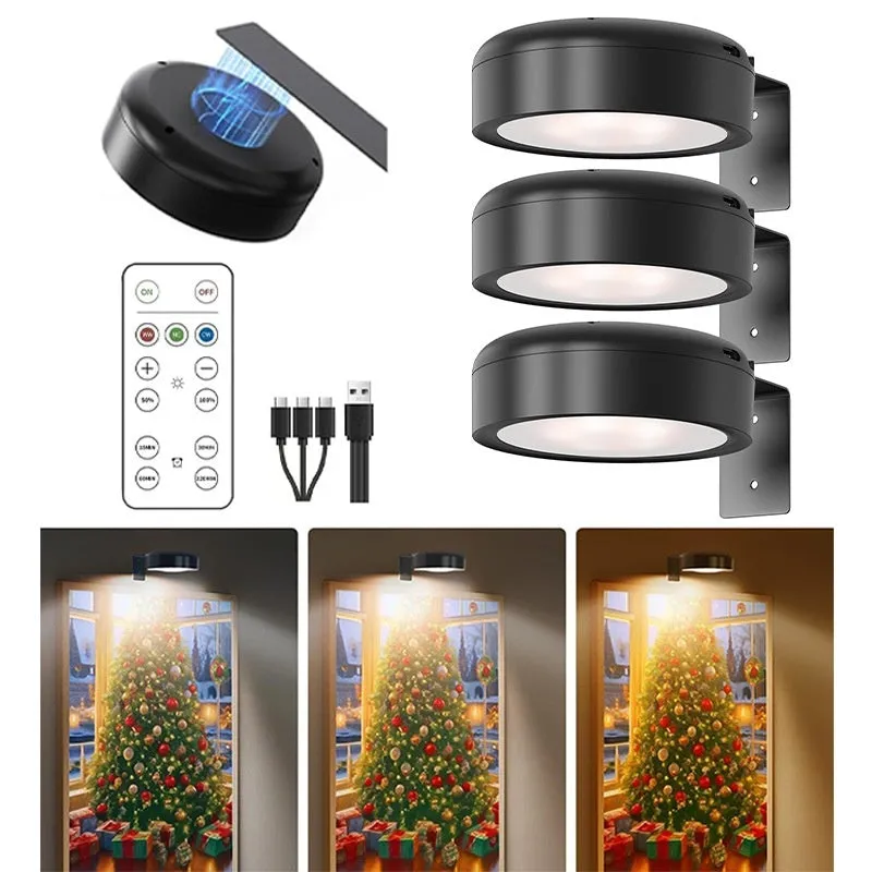Magnetic LED light bars mounted around a painting, with a remote control on a table nearby.