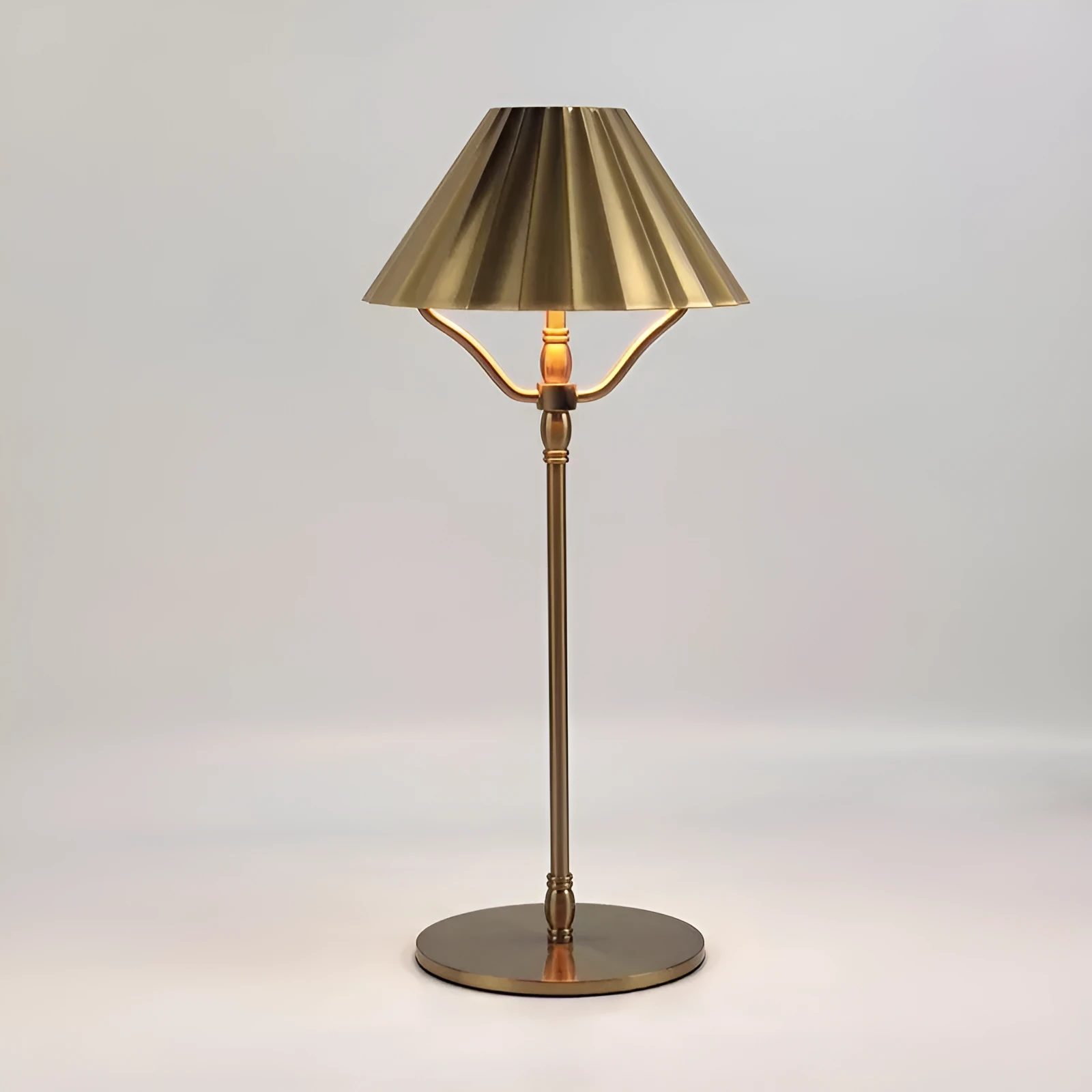 Gold-coloured alloy rechargeable desk lamp with USB-C port and touch dimming switch.