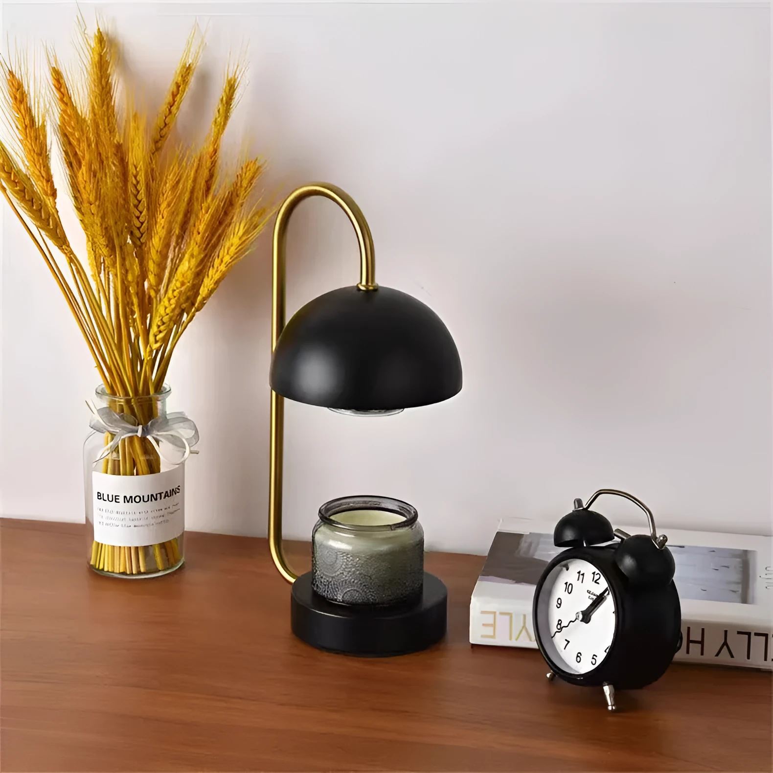 Solid wood aromatherapy wax melting lamp with dimmer knob on a wooden table