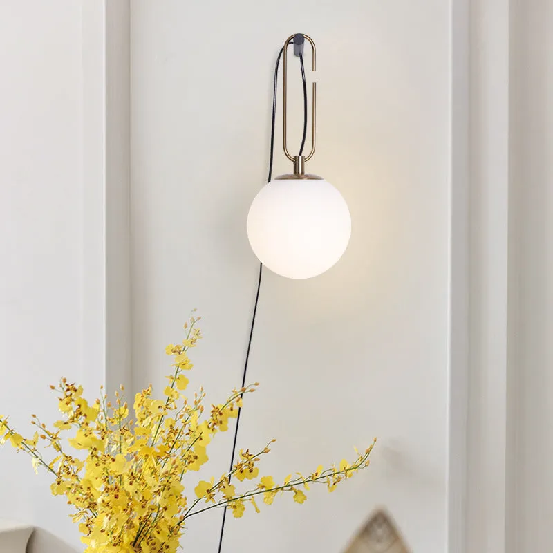 Nordic modern glass wall lamp mounted on a wall with three light colour temperature options displayed.