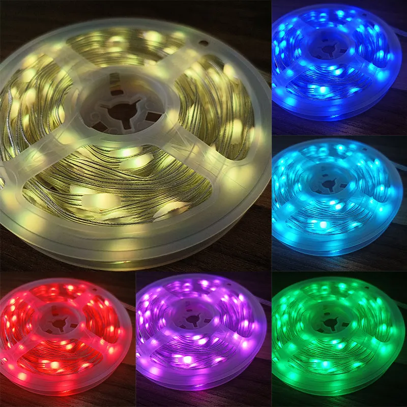 10-metre long flexible LED light string with 100 multi-colour bulbs lit up in a garden setting.