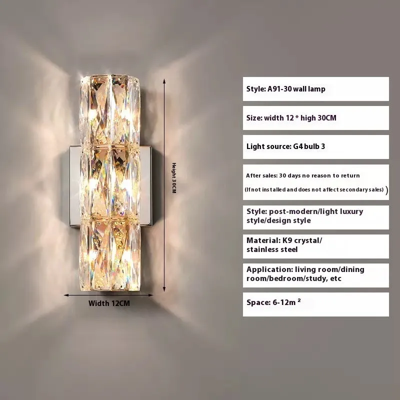 A sleek crystal wall lamp with a stainless steel base in chrome finish, mounted on a wall.