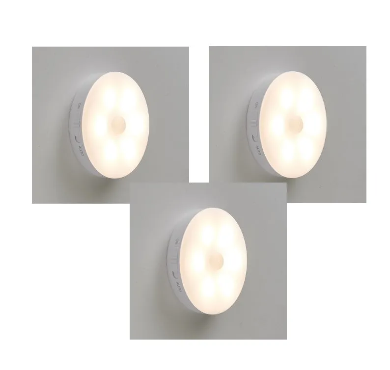 Two compact wireless motion sensor lights with induction charger.