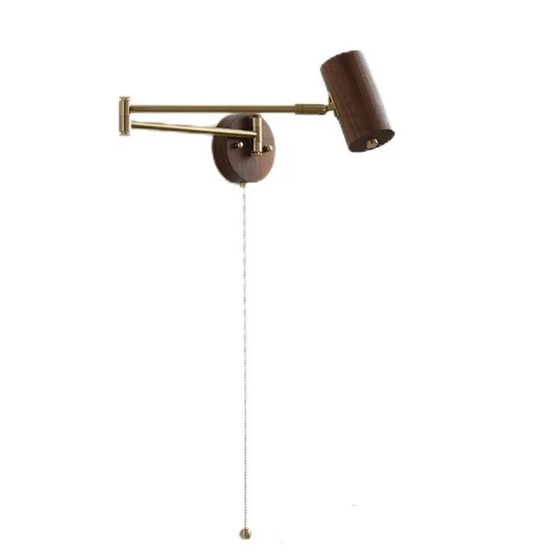 Retro-style long-arm wall spotlight with rotating head in walnut finish and a ribbon pull switch.