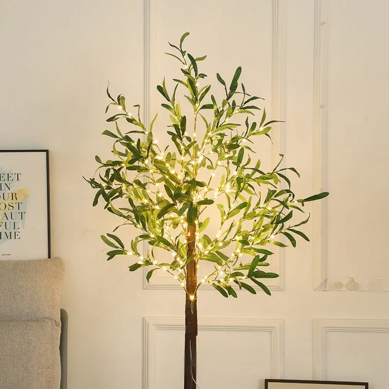 1.8m tall artificial olive tree lamp with warm white LED lights illuminating olive leaf foliage
