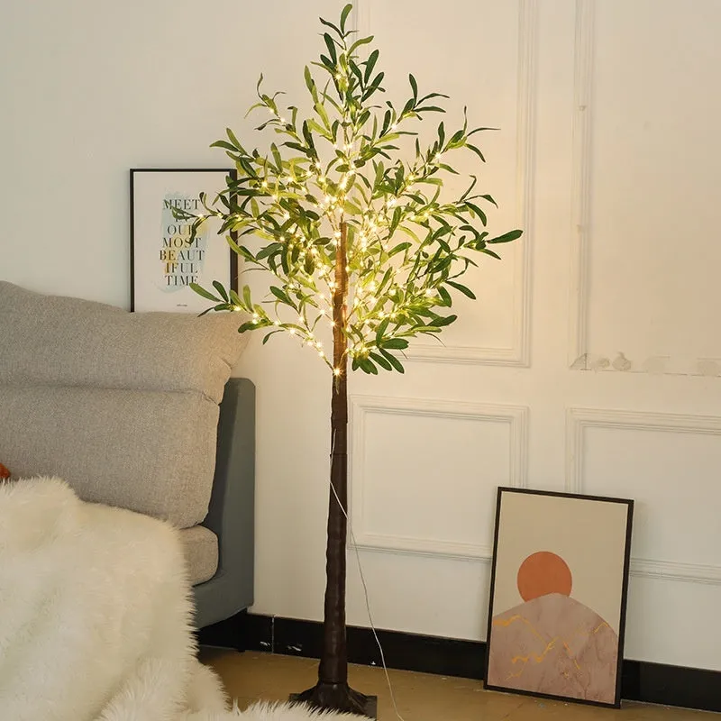 1.8m tall artificial olive tree lamp with warm white LED lights illuminating olive leaf foliage