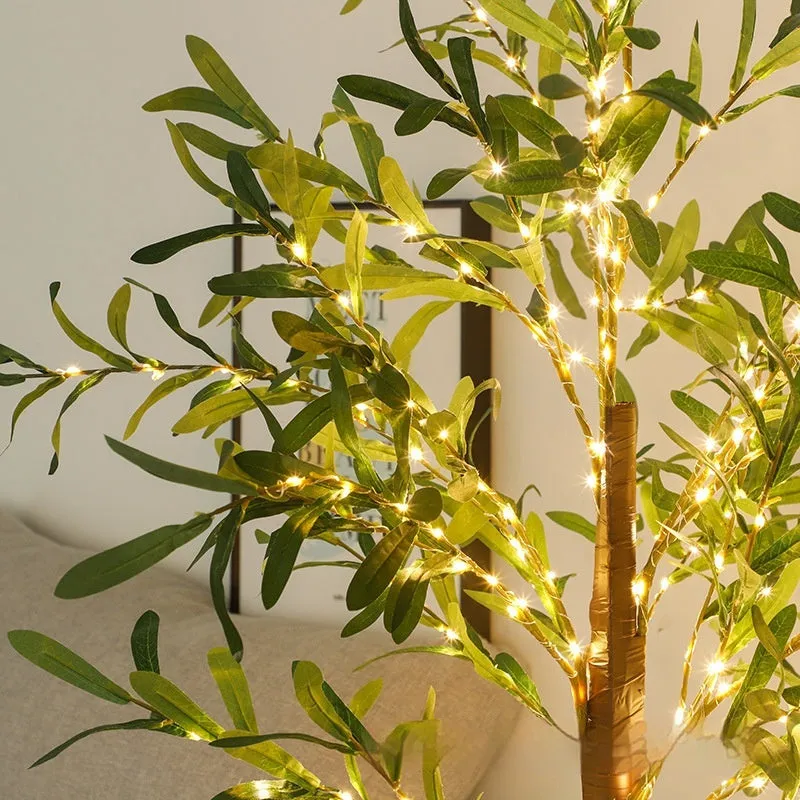 1.8m tall artificial olive tree lamp with warm white LED lights illuminating olive leaf foliage