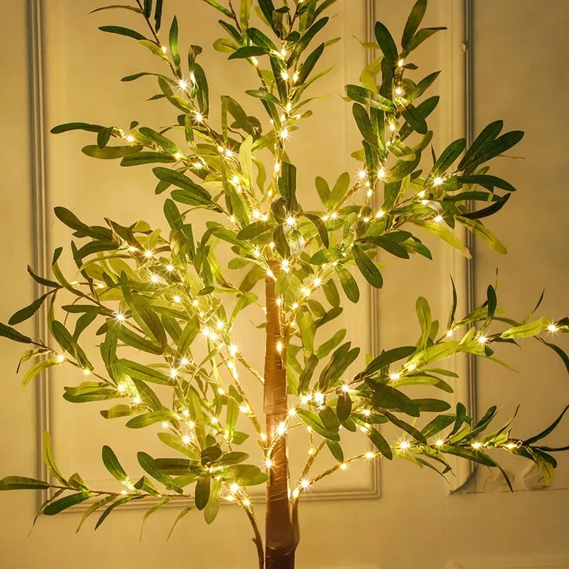1.8m tall artificial olive tree lamp with warm white LED lights illuminating olive leaf foliage