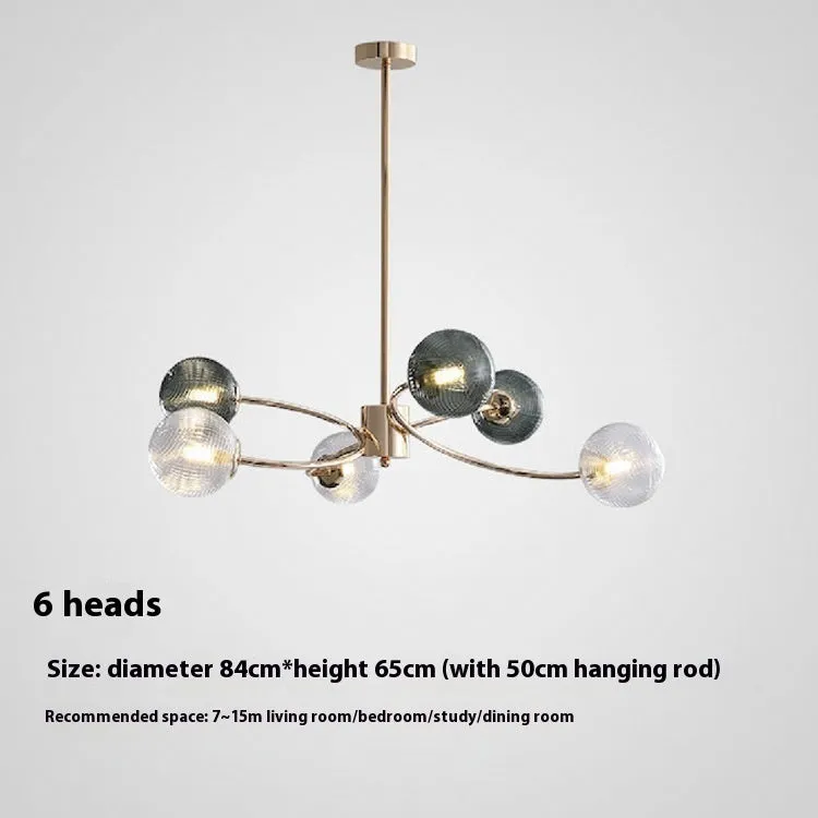 Modern Nordic style multi-head pendant chandelier with green clear lights for a living room.