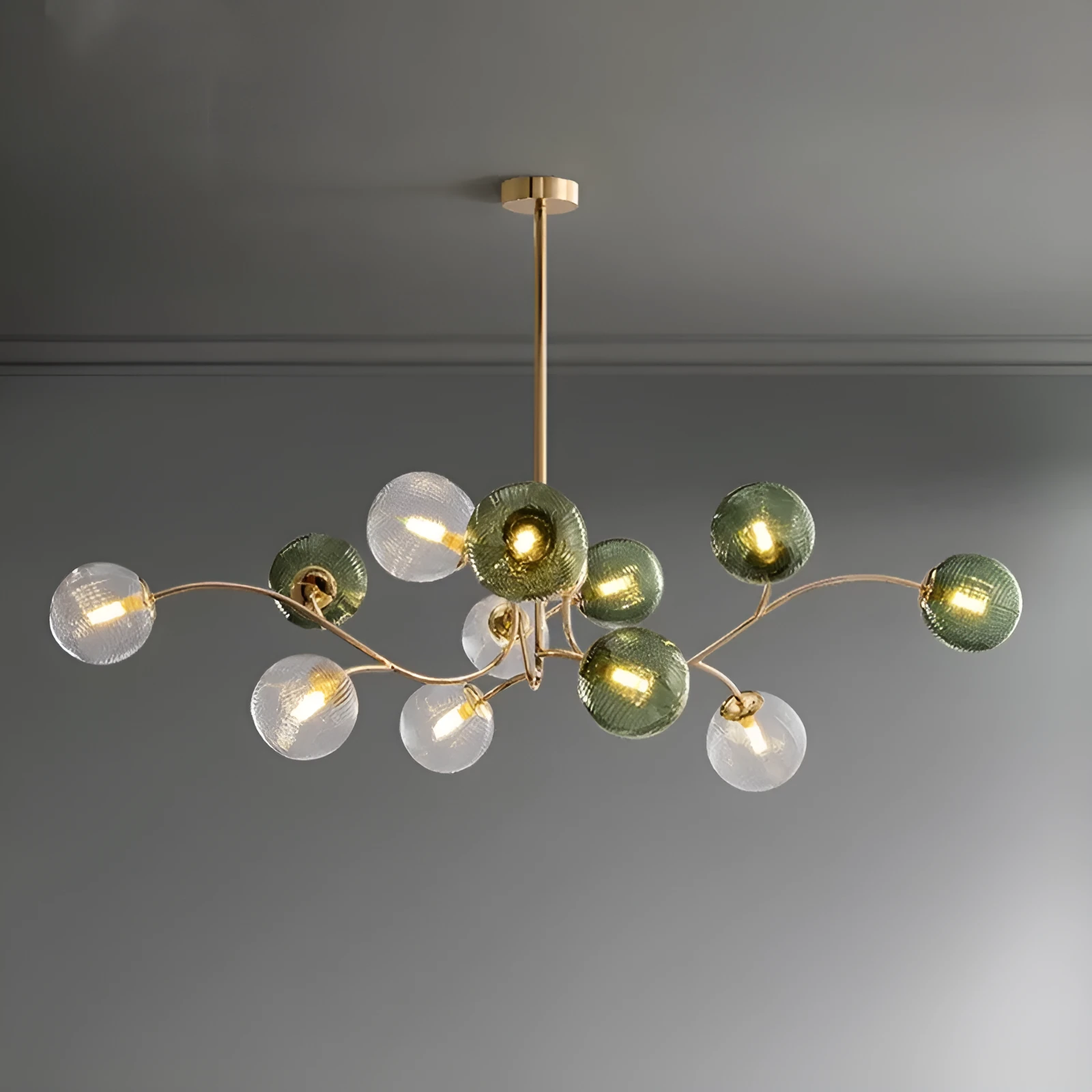 Modern Nordic style multi-head pendant chandelier with green clear lights for a living room.