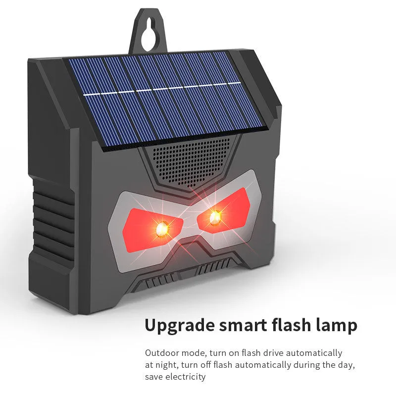 Black animal-shaped solar ultrasonic pest repeller for outdoor use.