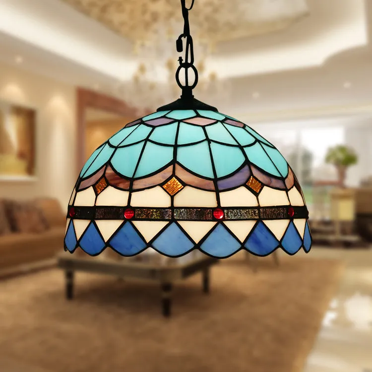 European baroque style chandelier with coloured glaze finish and abstract modelling.