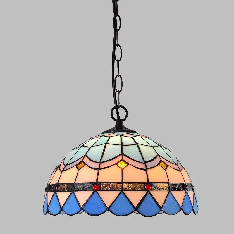 European baroque style chandelier with coloured glaze finish and abstract modelling.