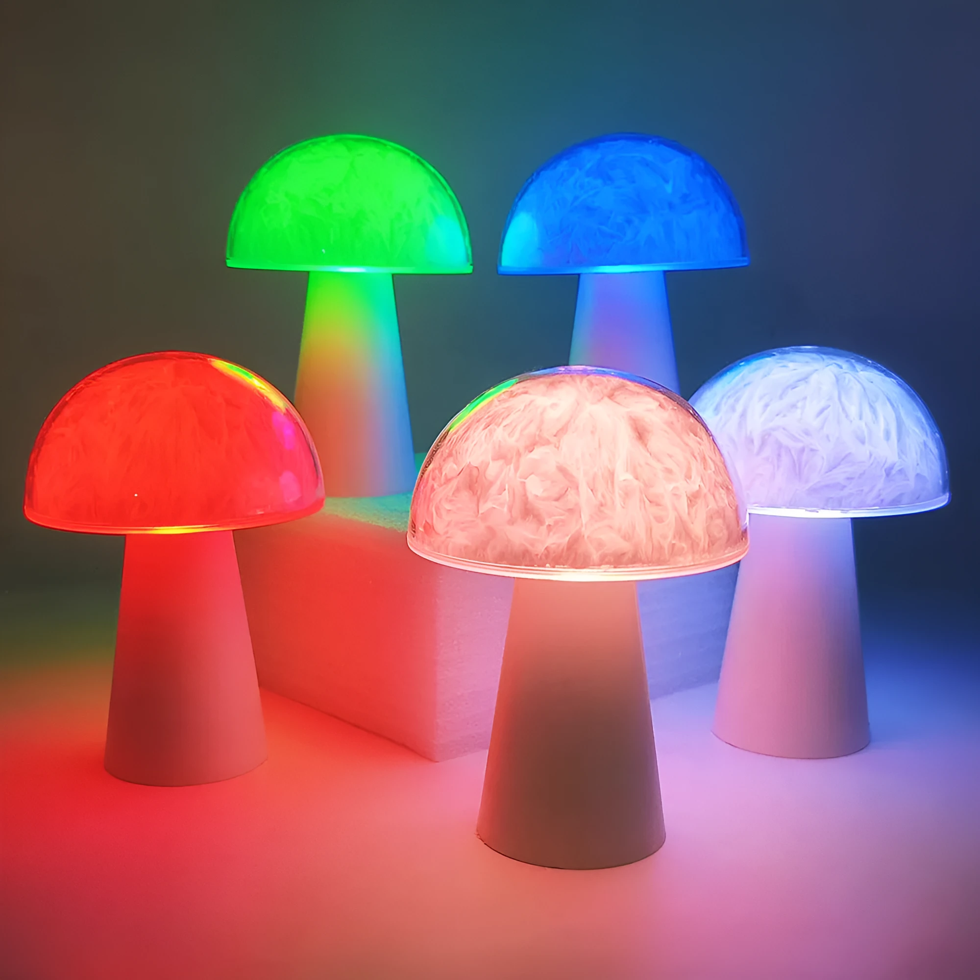 White mushroom-shaped night light with remote control on a wooden surface, showing soft RGB glow.
