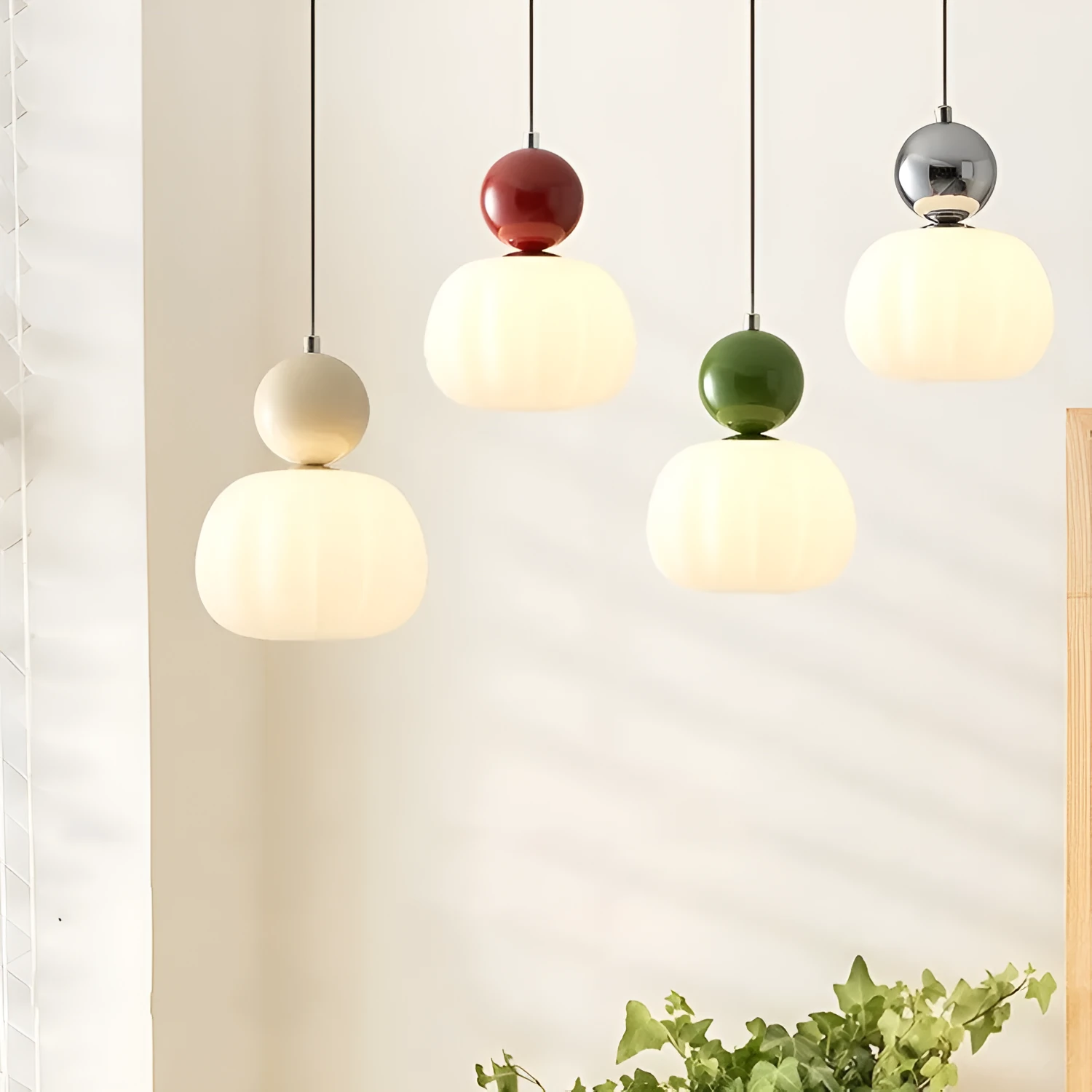 Creative pumpkin-shaped Nordic style ceiling chandelier in alloy, shown in single head and three head configurations.