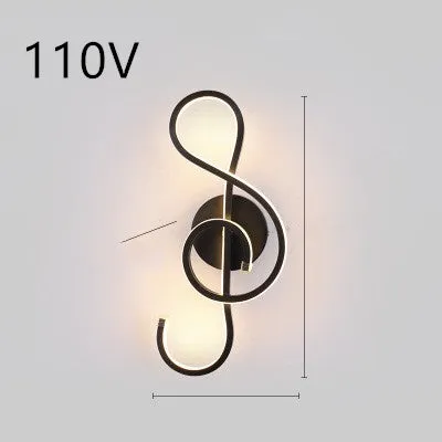 Nordic minimalist LED wall lamp with silicone shade in black finish mounted beside bed