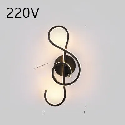 Nordic minimalist LED wall lamp with silicone shade in black finish mounted beside bed