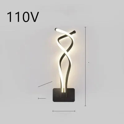 Nordic minimalist LED wall lamp with silicone shade in black finish mounted beside bed