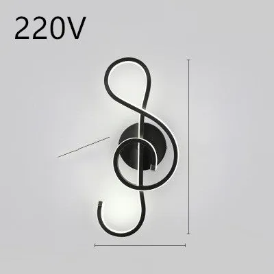Nordic minimalist LED wall lamp with silicone shade in black finish mounted beside bed