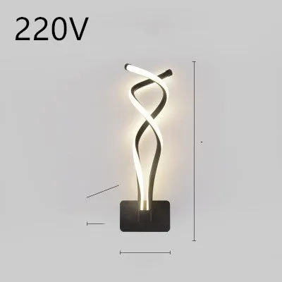 Nordic minimalist LED wall lamp with silicone shade in black finish mounted beside bed