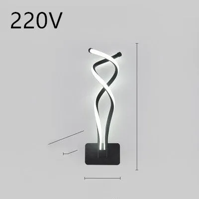 Nordic minimalist LED wall lamp with silicone shade in black finish mounted beside bed