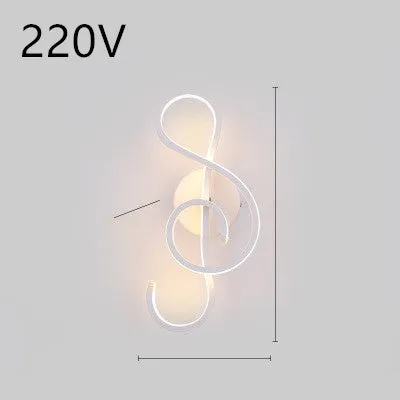 Nordic minimalist LED wall lamp with silicone shade in black finish mounted beside bed