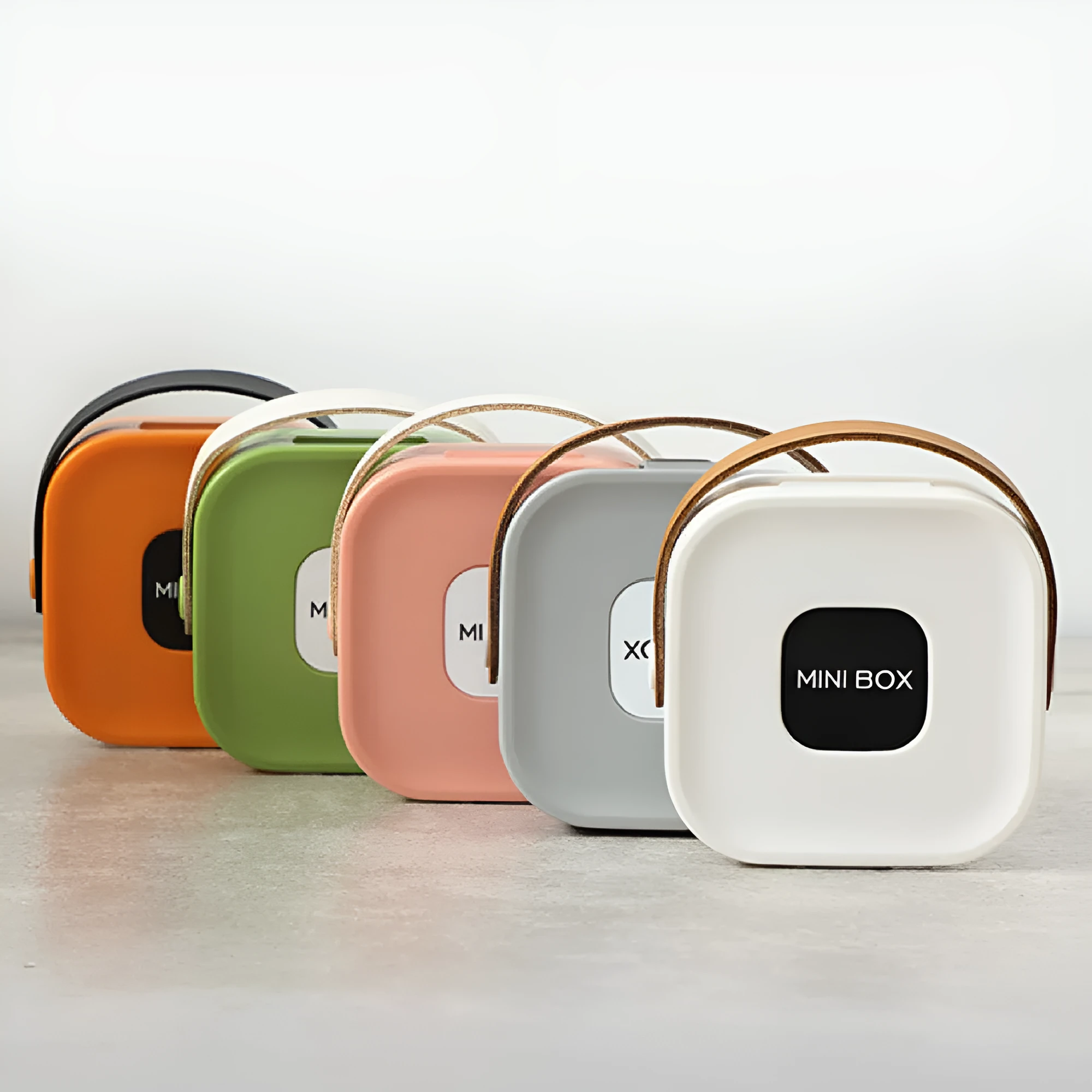 Medium solid-colour polypropylene storage box with lid for cables and headphones.