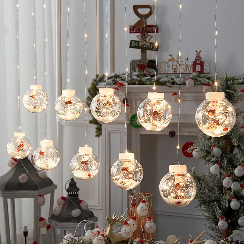 10-piece LED Christmas curtain light string with fairy, snowman and wishing ball decorations for windows