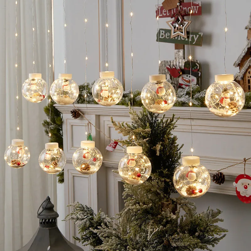 10-piece LED Christmas curtain light string with fairy, snowman and wishing ball decorations for windows