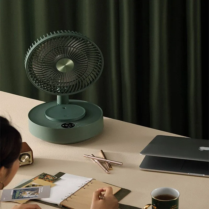 Green telescopic floor fan shown in both desktop and extended vertical positions with remote control