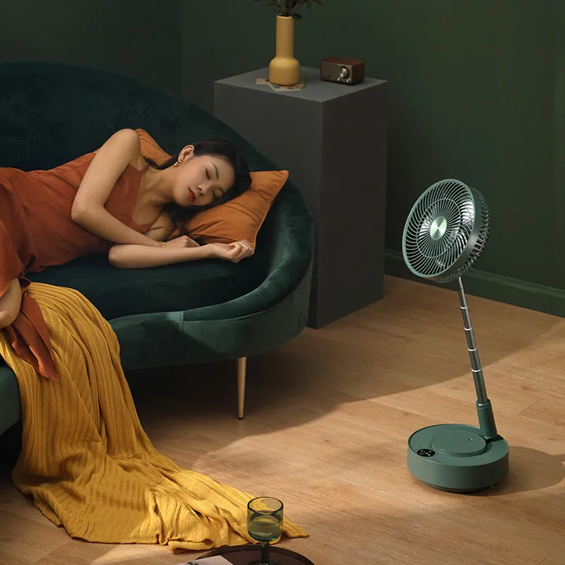Green telescopic floor fan shown in both desktop and extended vertical positions with remote control