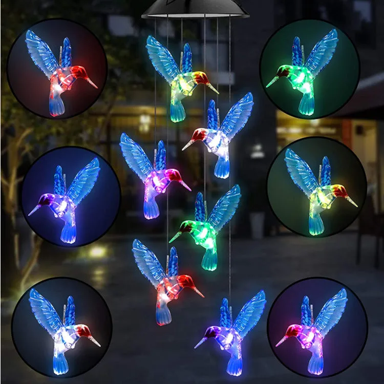 Outdoor solar wind chime lamp with LED lights in hummingbird butterfly design for garden decoration
