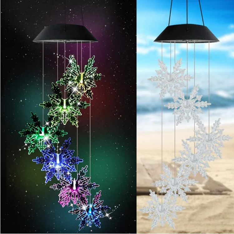 Outdoor solar wind chime lamp with LED lights in hummingbird butterfly design for garden decoration