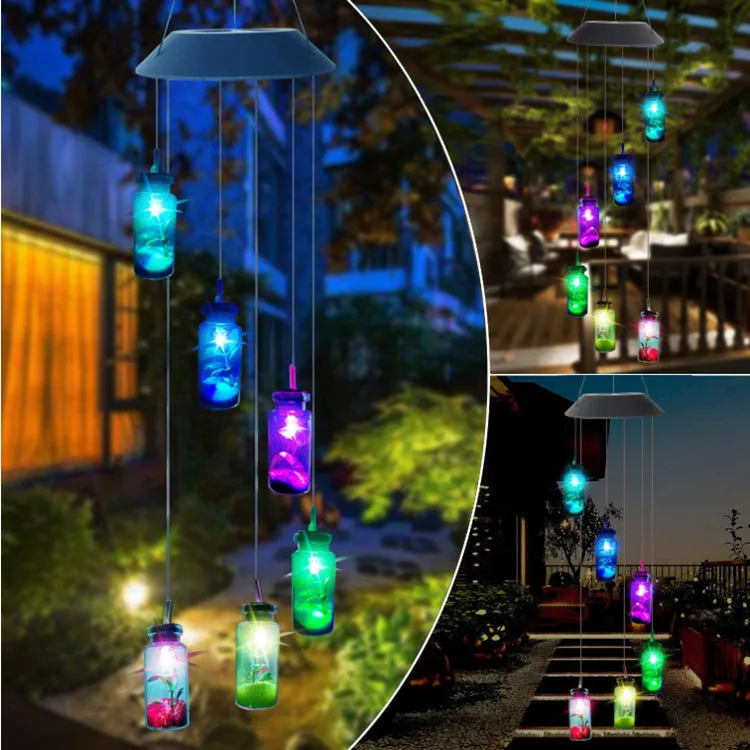 Outdoor solar wind chime lamp with LED lights in hummingbird butterfly design for garden decoration