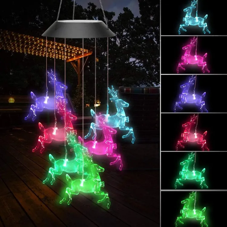 Outdoor solar wind chime lamp with LED lights in hummingbird butterfly design for garden decoration