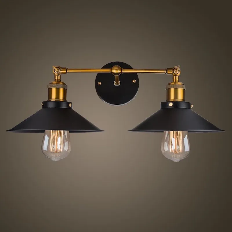 Black double head American retro industrial style iron wall lamp on a dark wall.