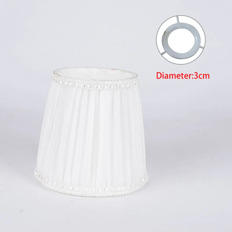 Fabric lampshade for crystal wall lamp in dark blue, white or black with bubble or pion pattern.