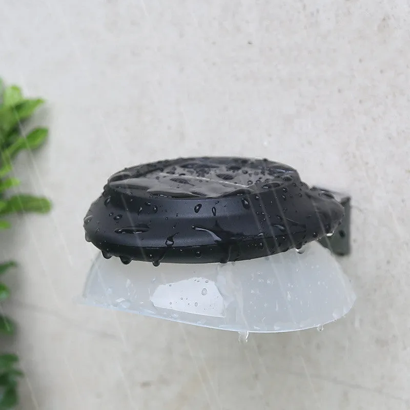 Solar-powered outdoor fence wall lamp with Southeast Asian design mounted on garden fence
