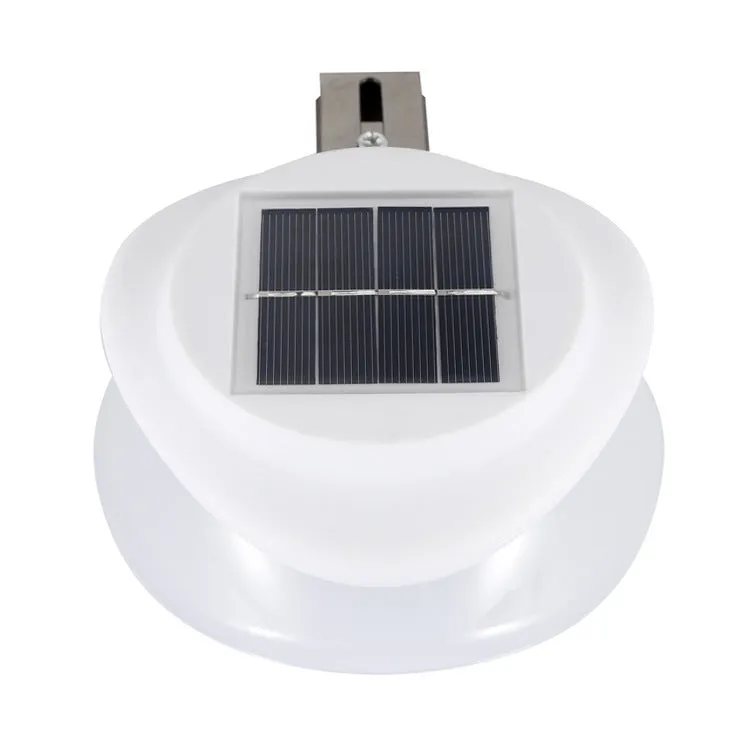Solar-powered outdoor fence wall lamp with Southeast Asian design mounted on garden fence