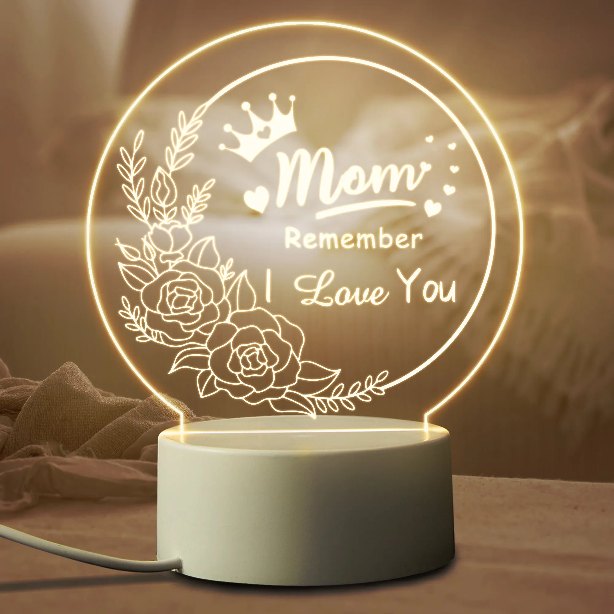 Modern acrylic LED night light with ABS base in one of 16 available colours, showing warm white glow