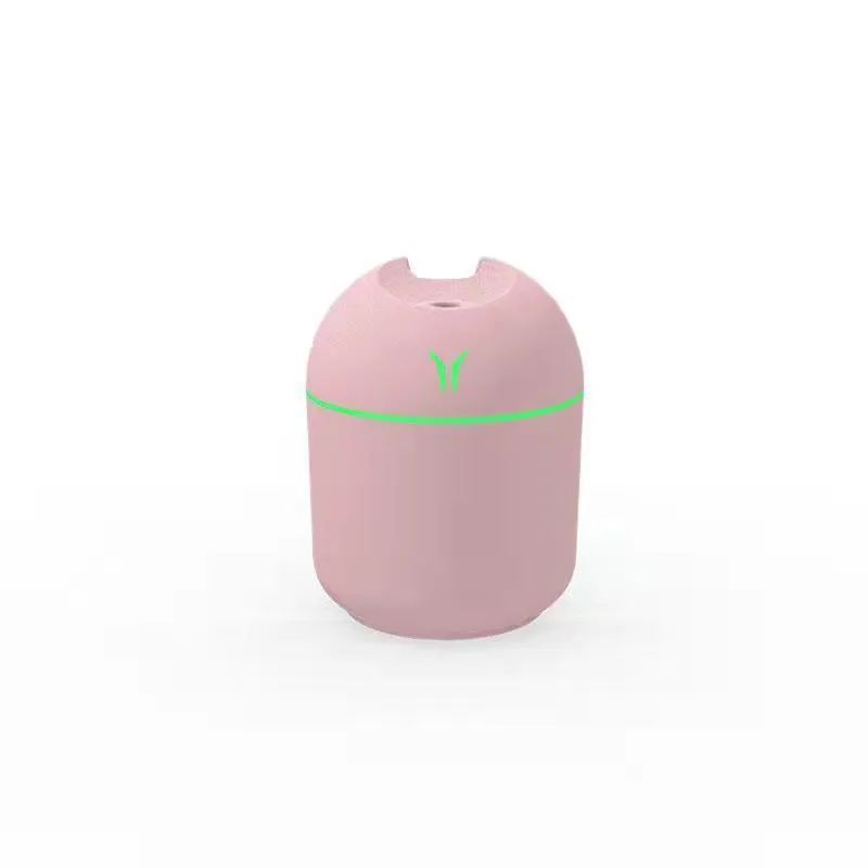 Round desktop humidifier with USB cable and water tank in ivory white, sky blue, or girlish pink colours.