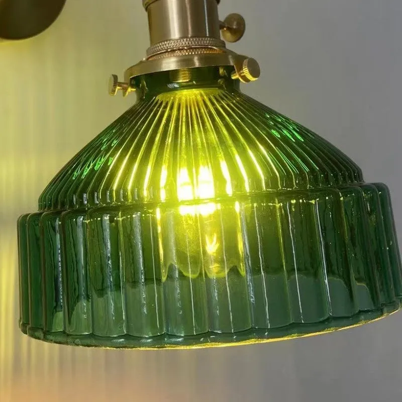 Nordic-style brass and glass chandelier light fixture with an adjustable cord.