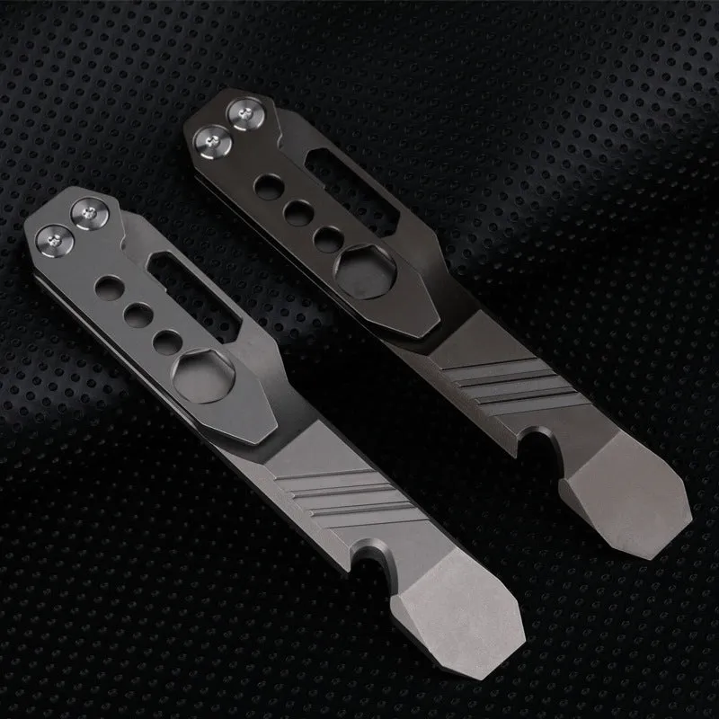 Titanium alloy multi-function crowbar tool with screwdriver tip and bottle opener in stone wash finish.