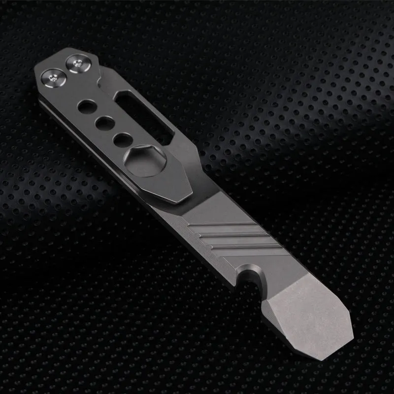 Titanium alloy multi-function crowbar tool with screwdriver tip and bottle opener in stone wash finish.