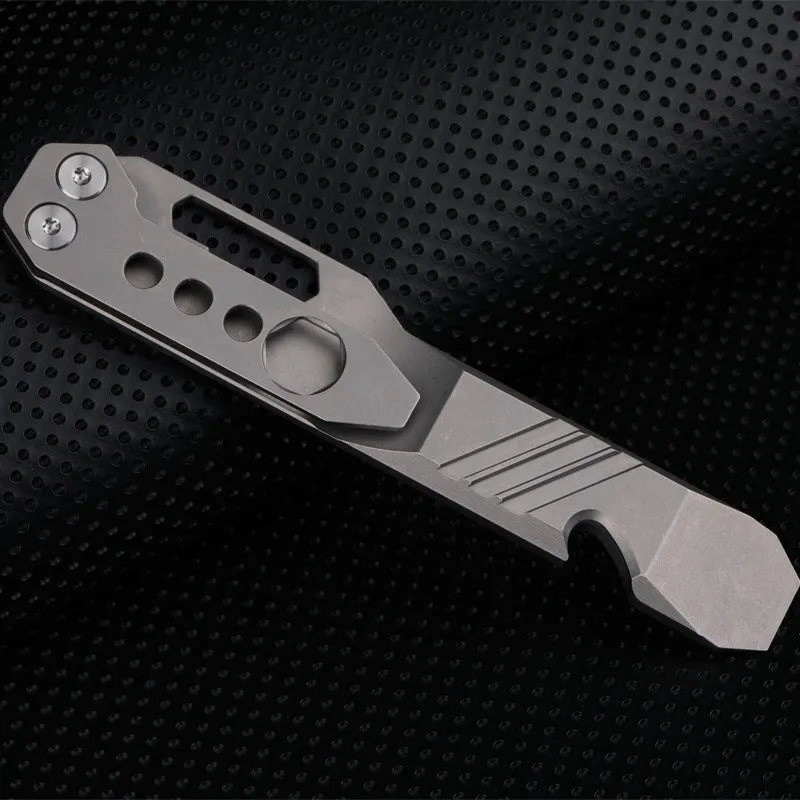 Titanium alloy multi-function crowbar tool with screwdriver tip and bottle opener in stone wash finish.
