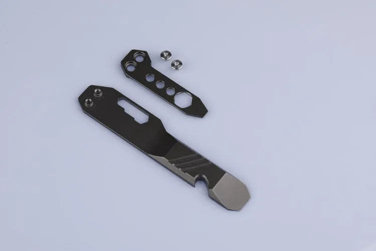 Titanium alloy multi-function crowbar tool with screwdriver tip and bottle opener in stone wash finish.
