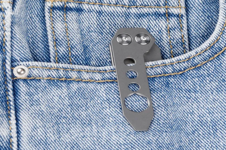 Titanium alloy multi-function crowbar tool with screwdriver tip and bottle opener in stone wash finish.